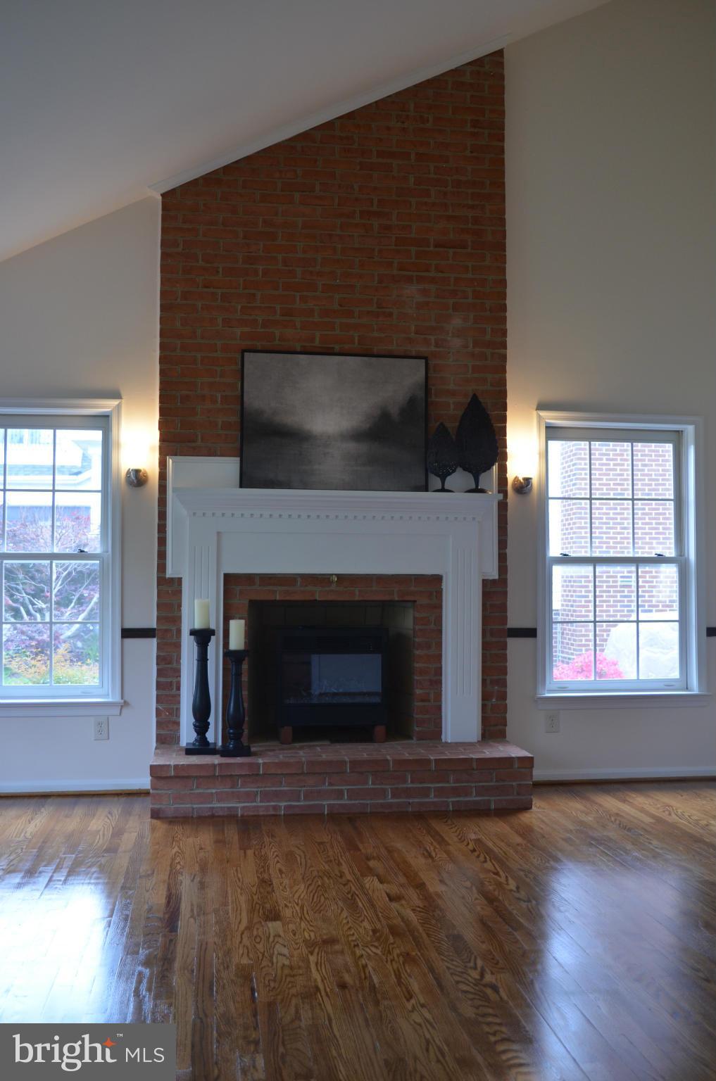 7144 Poole Jones Road Frederick, MD 21702 - Photo 3 of 29 Floor to ceiling brick fireplace w/ raised hearth