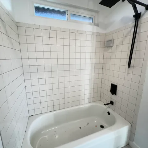 a bathroom with a bathtub