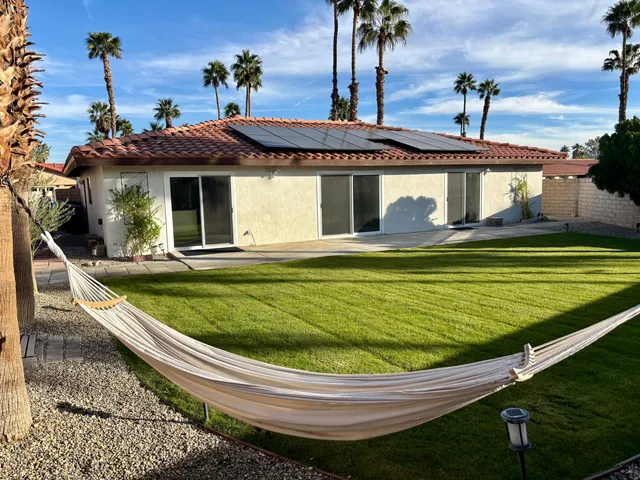 a view of a house with a swimming pool