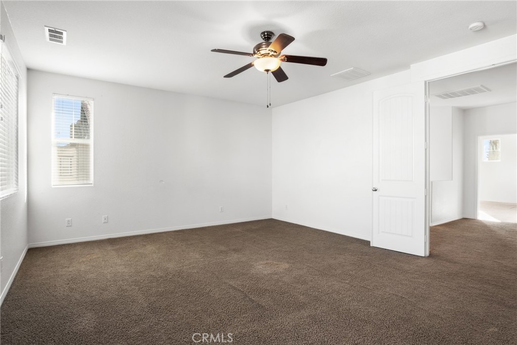 30272 Tattersail Way Menifee, CA 92584 - Photo 23 of 44 a view of an empty room