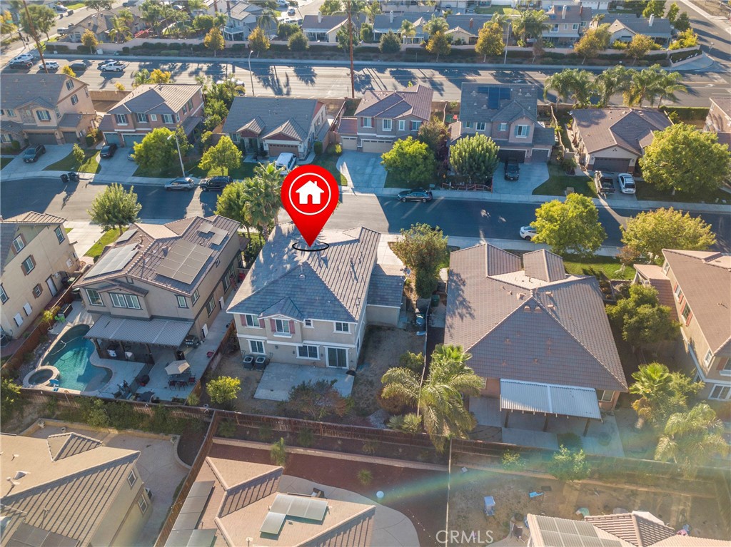 30272 Tattersail Way Menifee, CA 92584 - Photo 29 of 44 an aerial view of a house with swimming pool and outdoor seating