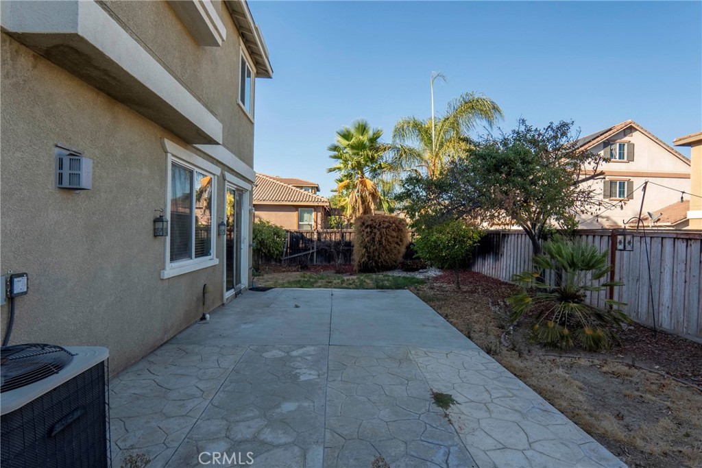 30272 Tattersail Way Menifee, CA 92584 - Photo 30 of 44 a view of a front of house with a yard