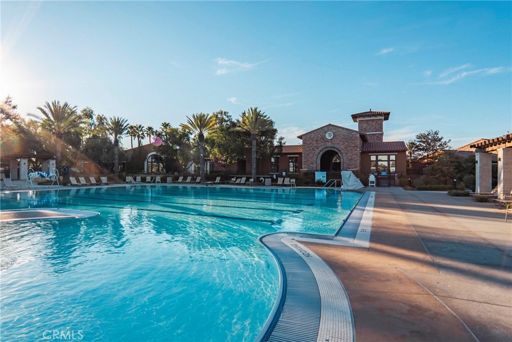 30272 Tattersail Way Menifee, CA 92584 - Photo 35 of 44 a view of a house with a yard and a fountain
