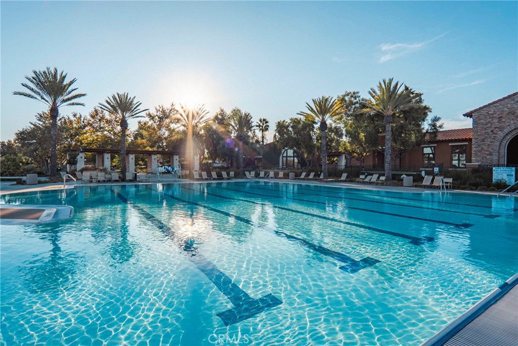 30272 Tattersail Way Menifee, CA 92584 - Photo 36 of 44 a view of a lake with a house in the background