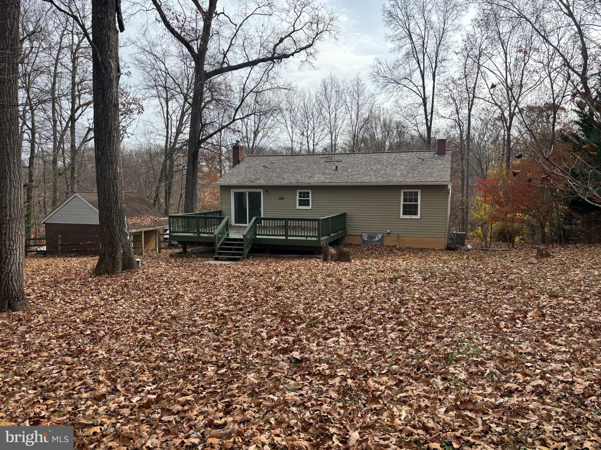 2213 Green Haven Way Hampstead, MD 21074 - Photo 6 of 15 a front view of a house with garden