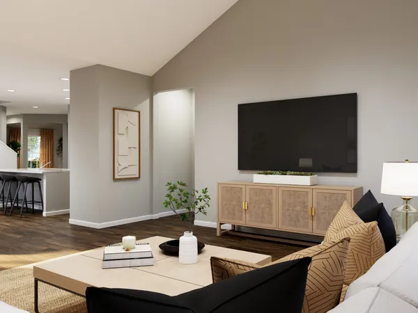 a bedroom with a bed and a potted plant