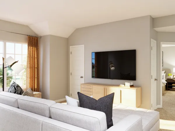 a bedroom with a bed and a mirror