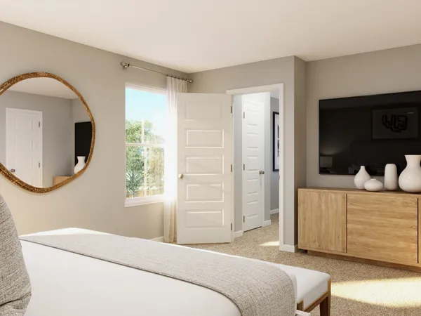 a white bath tub sitting next to a white toilet