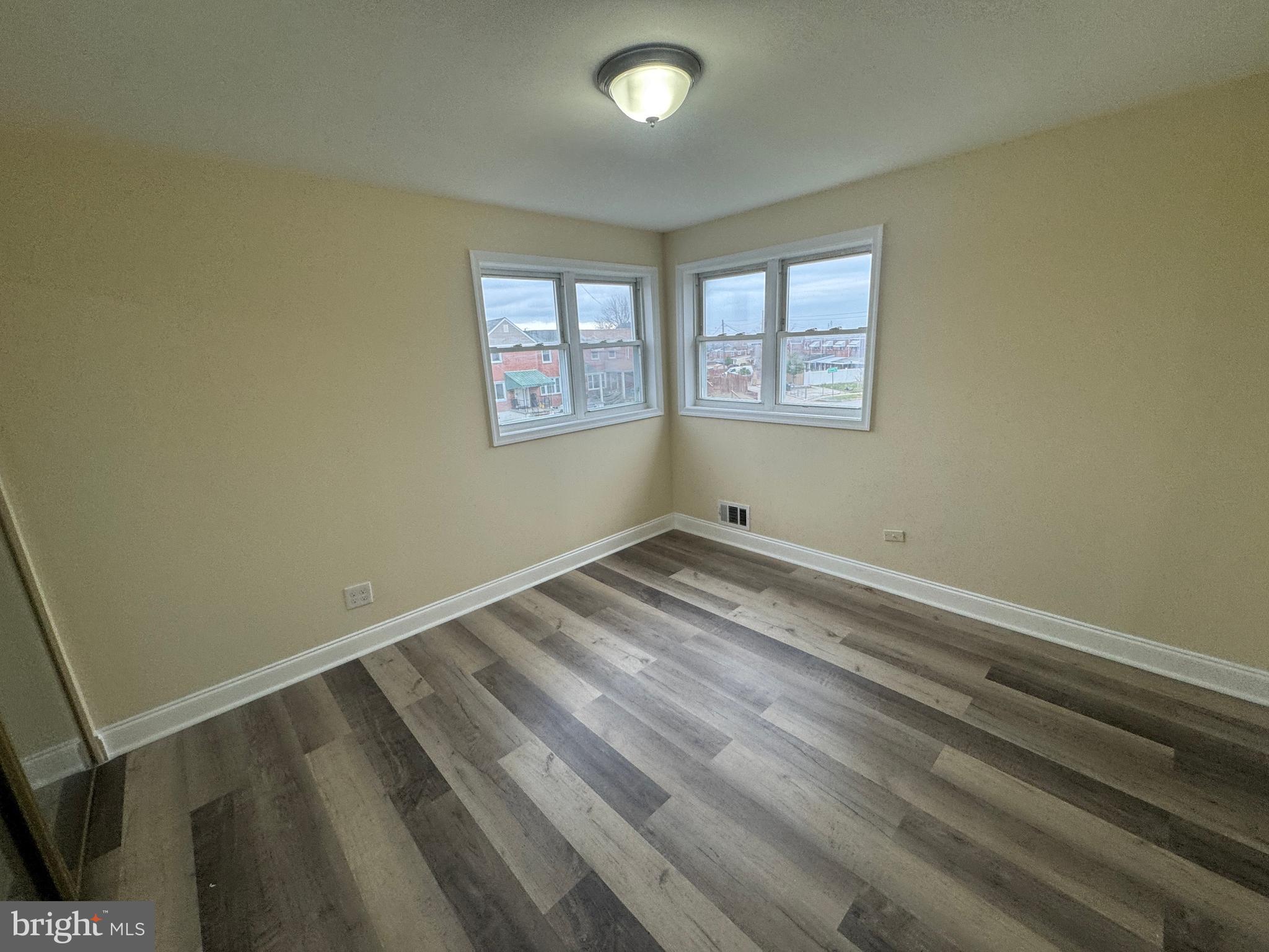 7445 Edsworth Road Baltimore, MD 21222 - Photo 12 of 37 a view of a room with a window