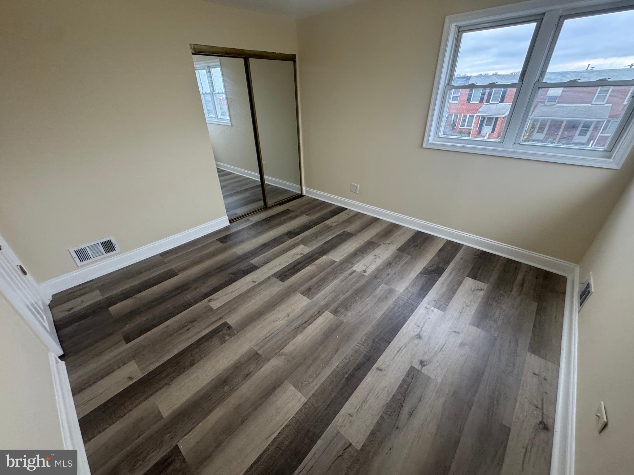 7445 Edsworth Road Baltimore, MD 21222 - Photo 17 of 37 a view of an empty room