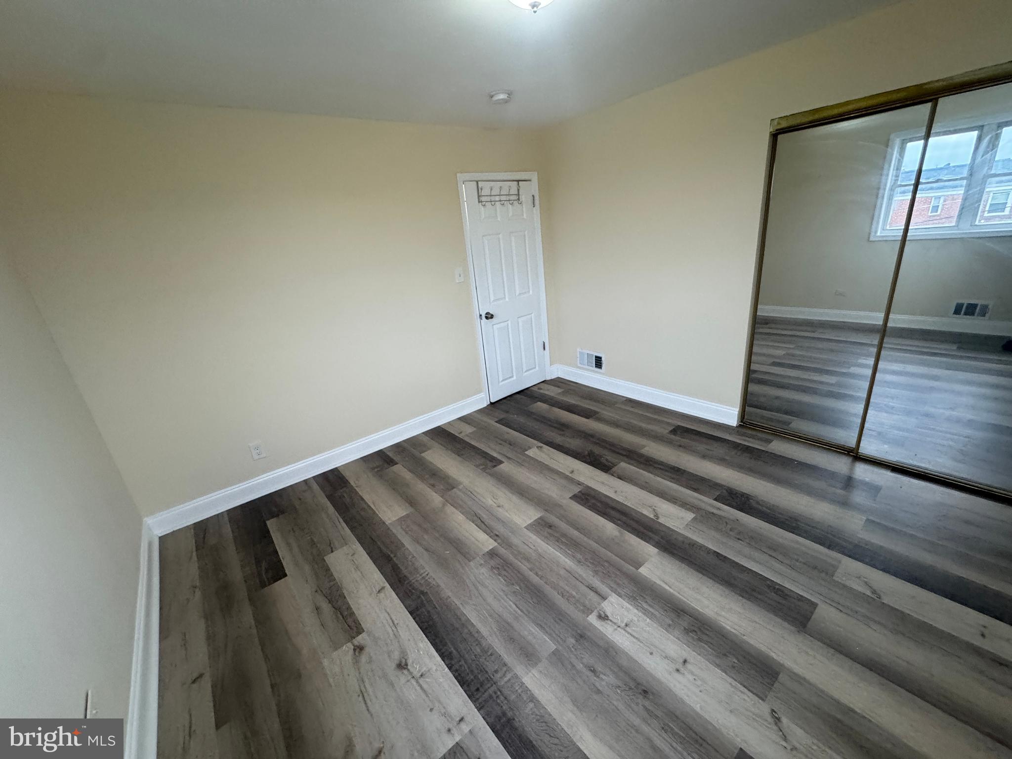 7445 Edsworth Road Baltimore, MD 21222 - Photo 18 of 37 a view of wooden floor