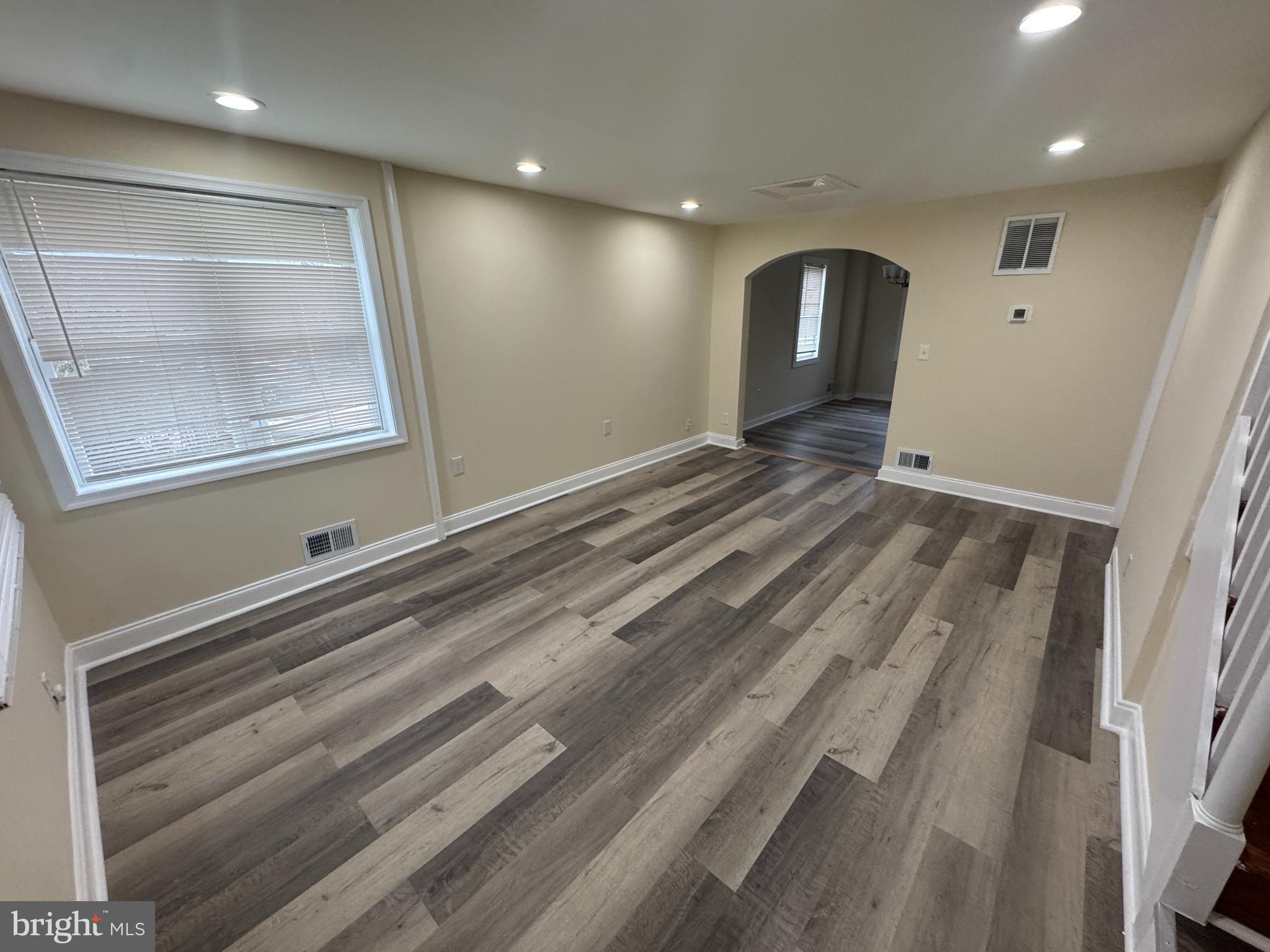 7445 Edsworth Road Baltimore, MD 21222 - Photo 2 of 37 a view of an empty room