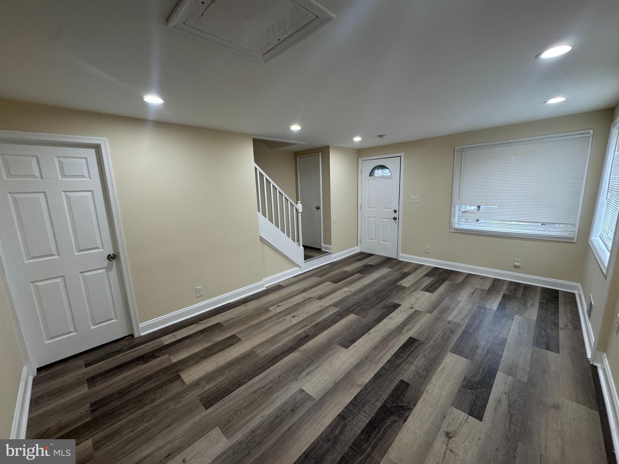 7445 Edsworth Road Baltimore, MD 21222 - Photo 5 of 37 a view of an empty room