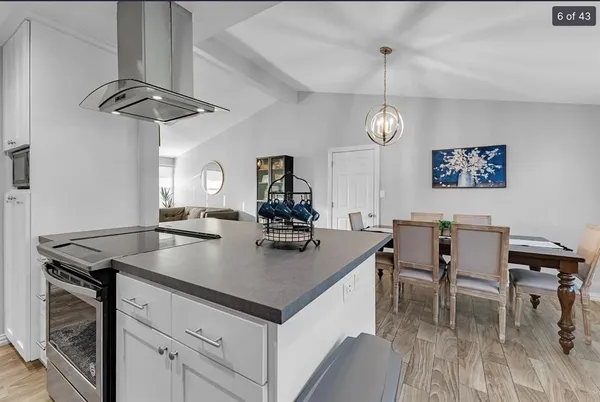 a view of a table and chairs in kitchen