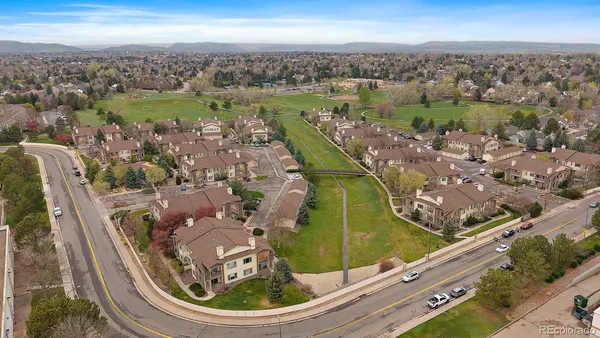 an aerial view of a house with a lake view