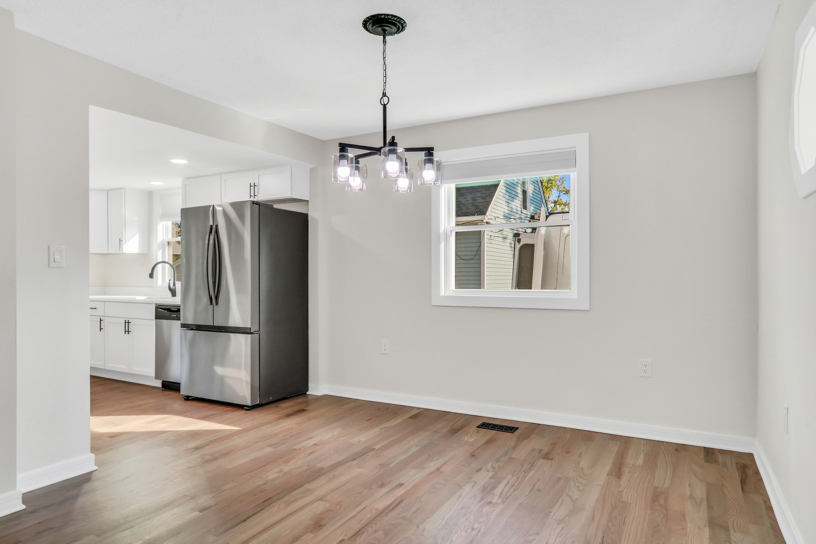 27065 North Ridge Street Wauconda, IL 60084 - Photo 15 of 33 a kitchen with stainless steel appliances a refrigerator and a stove top oven