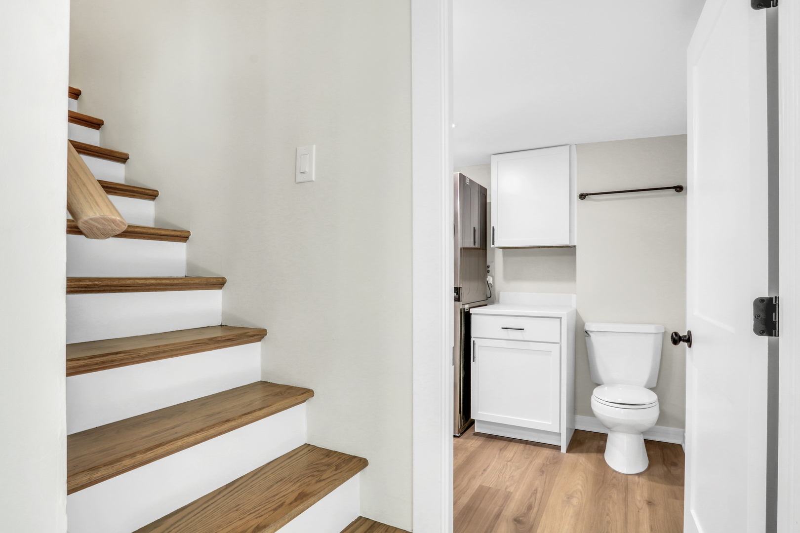 27065 North Ridge Street Wauconda, IL 60084 - Photo 22 of 33 a white toilet sitting next to a bathroom sink