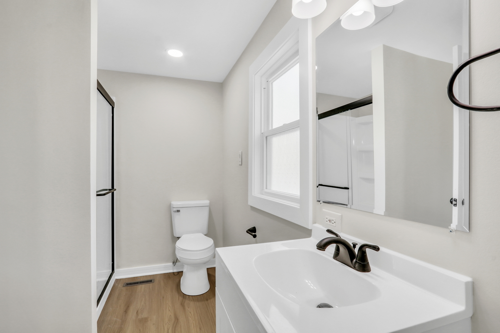 27065 North Ridge Street Wauconda, IL 60084 - Photo 27 of 33 a bathroom with a sink and a toilet