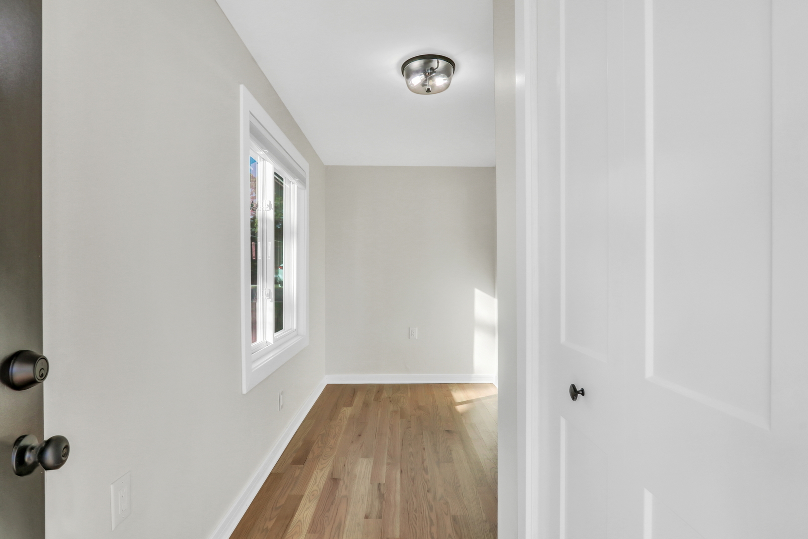27065 North Ridge Street Wauconda, IL 60084 - Photo 10 of 33 a view of a hallway with front door