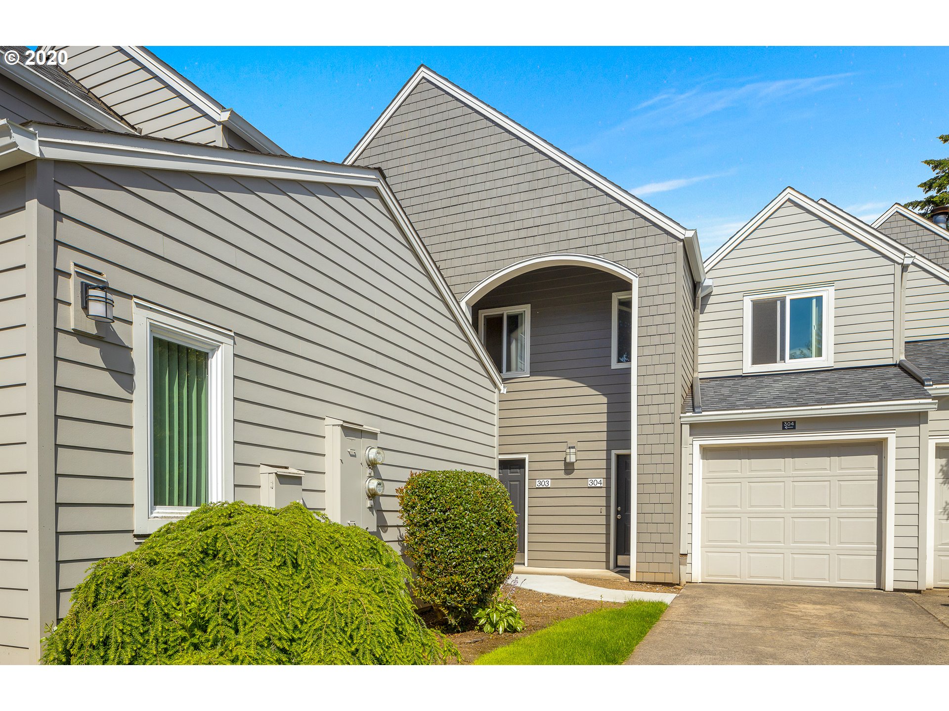 5225 Jean Road, Unit 304 Lake Oswego, OR 97035 - Photo 1 of 23 a view of a house with a small entryway