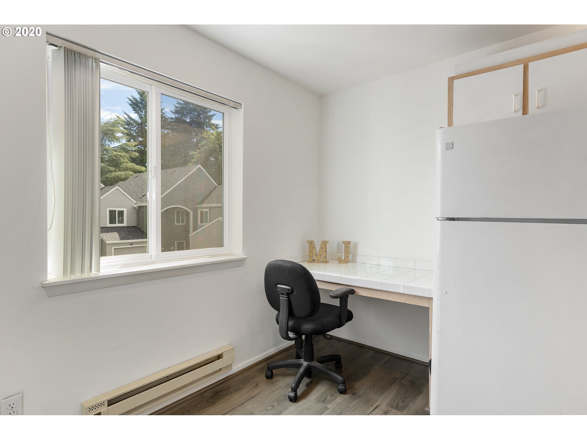5225 Jean Road, Unit 304 Lake Oswego, OR 97035 - Photo 10 of 23 a view of a workspace with furniture and a window