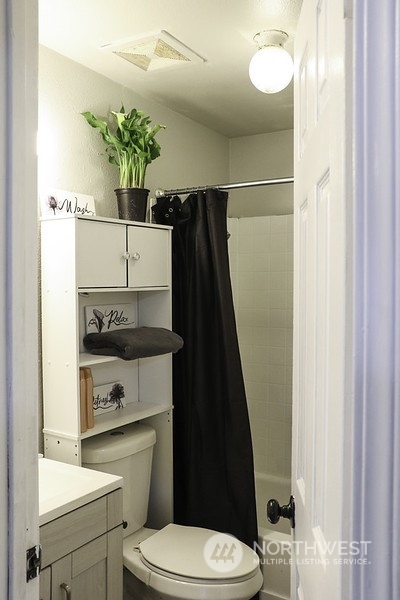 18124 Corvallis Street Southwest Rochester, WA 98579 - Photo 12 of 21 a bathroom with a sink toilet and shower