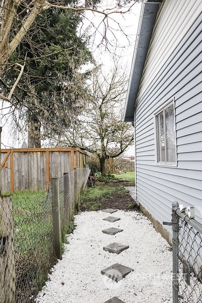18124 Corvallis Street Southwest Rochester, WA 98579 - Photo 18 of 21 a view of a backyard with pathway