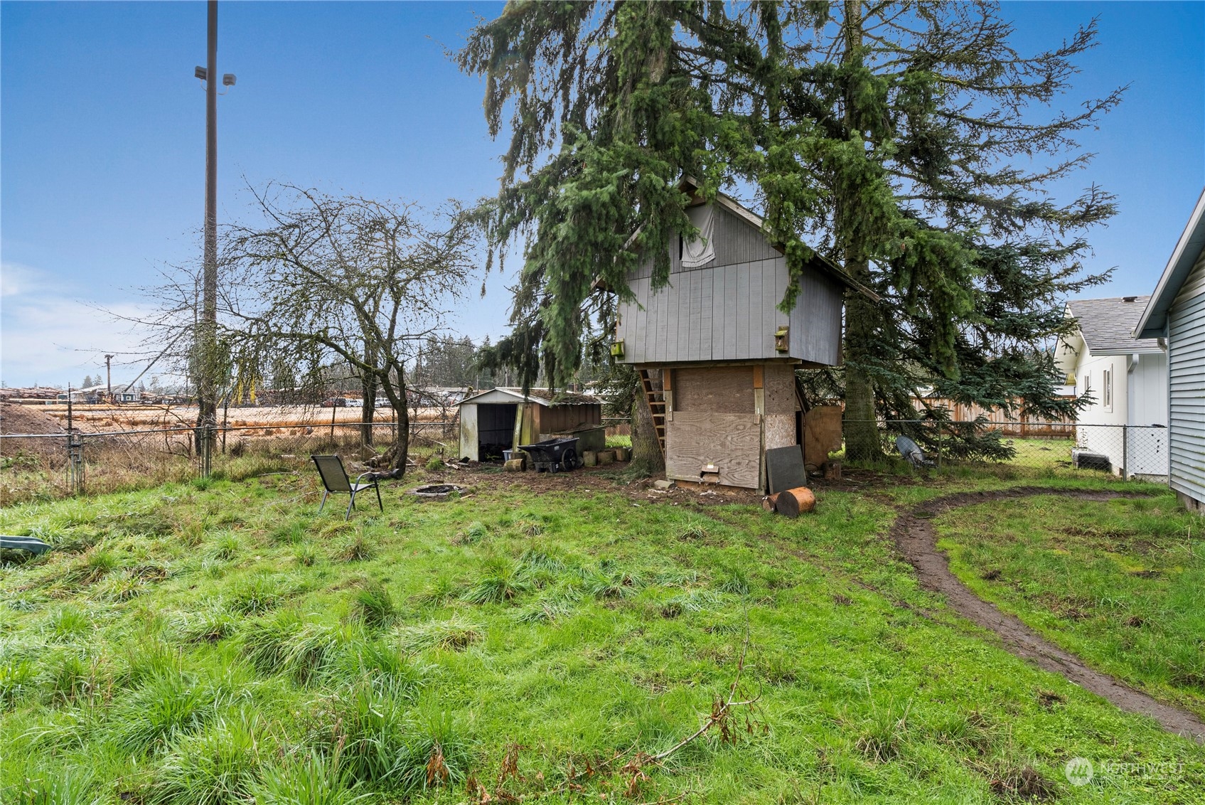 18124 Corvallis Street Southwest Rochester, WA 98579 - Photo 20 of 21 a view of a house with a yard