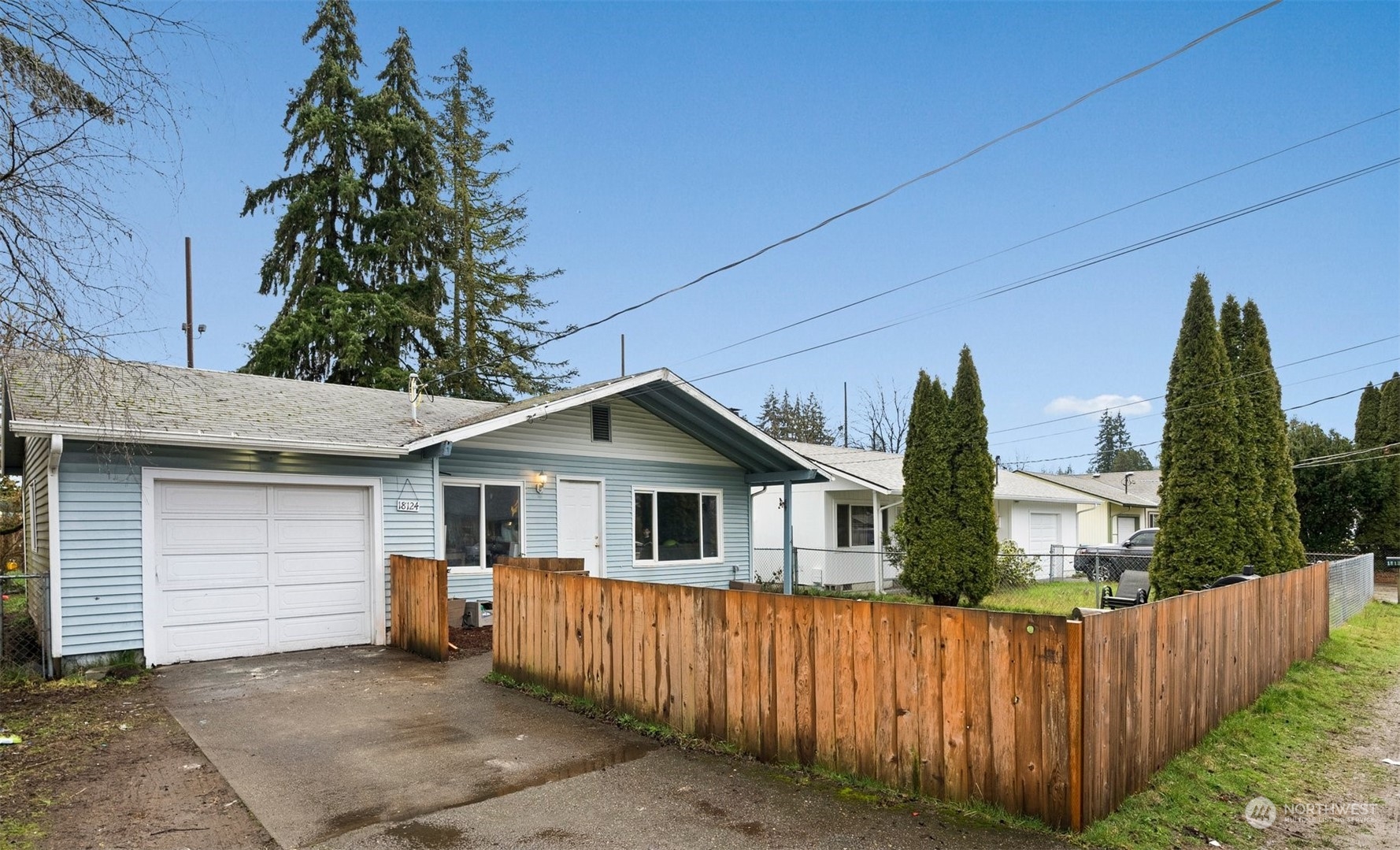 18124 Corvallis Street Southwest Rochester, WA 98579 - Photo 3 of 21 a view of a house with wooden fence