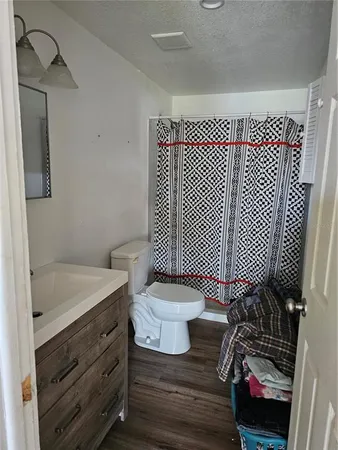 a bedroom with furniture and a bed