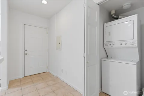 a view of storage and utility room with washer and dryer