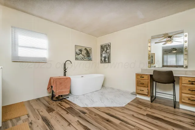 a kitchen with stainless steel appliances kitchen island granite countertop a sink and cabinets