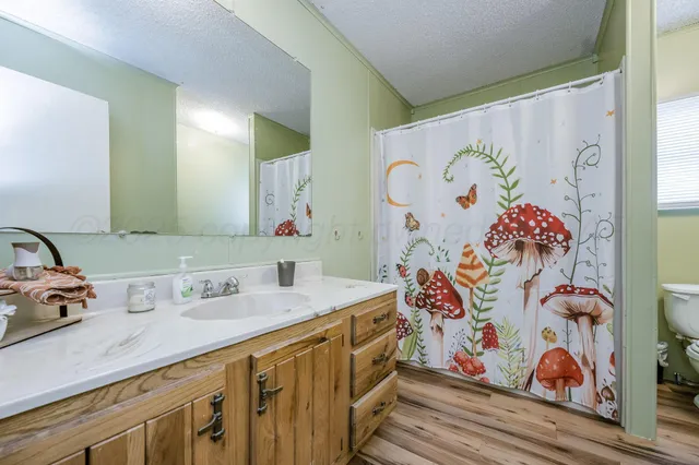 a view of a workspace with furniture