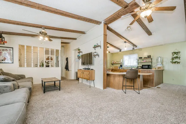 a view of a dining room with furniture