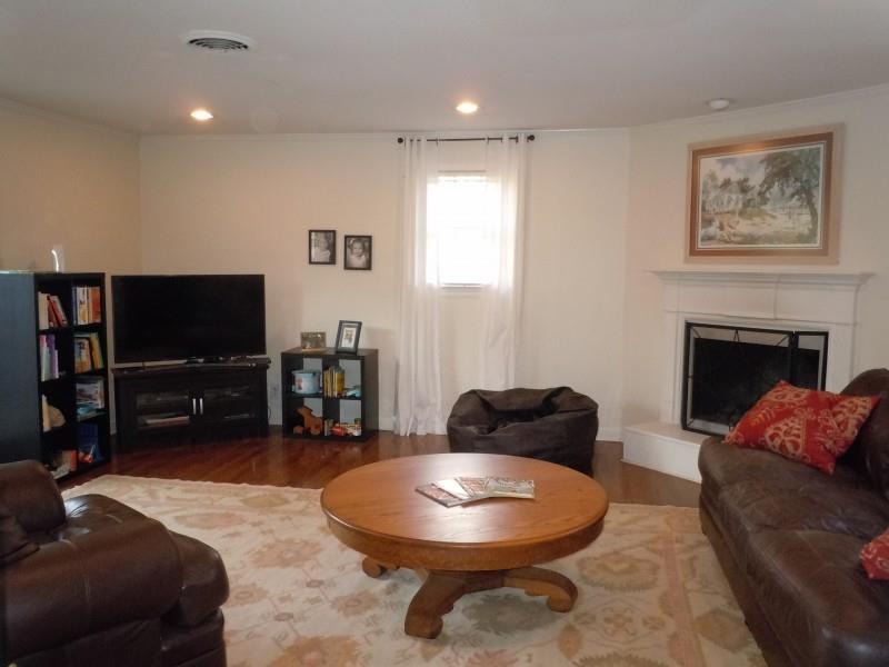 149 Alton Road Nashville, TN 37205 - Photo 16 of 19 a living room with furniture and a flat screen tv
