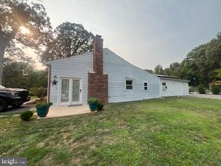 11064 Demarr Road White Plains, MD 20695 - Photo 27 of 98 a view of a house with a back yard