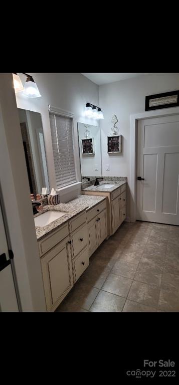 14100 Sunnyhill Grove Road Davidson, NC 28036 - Photo 5 of 18 a view of cabinets a sink and dishwasher in a kitchen