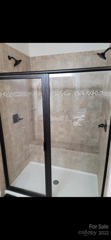 14100 Sunnyhill Grove Road Davidson, NC 28036 - Photo 6 of 18 a view of bathroom with shower