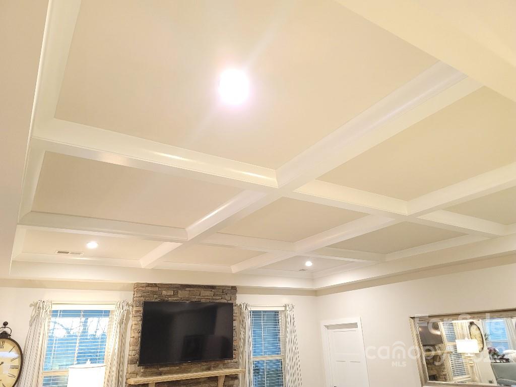 14100 Sunnyhill Grove Road Davidson, NC 28036 - Photo 8 of 18 a view of living room with furniture and flat screen tv