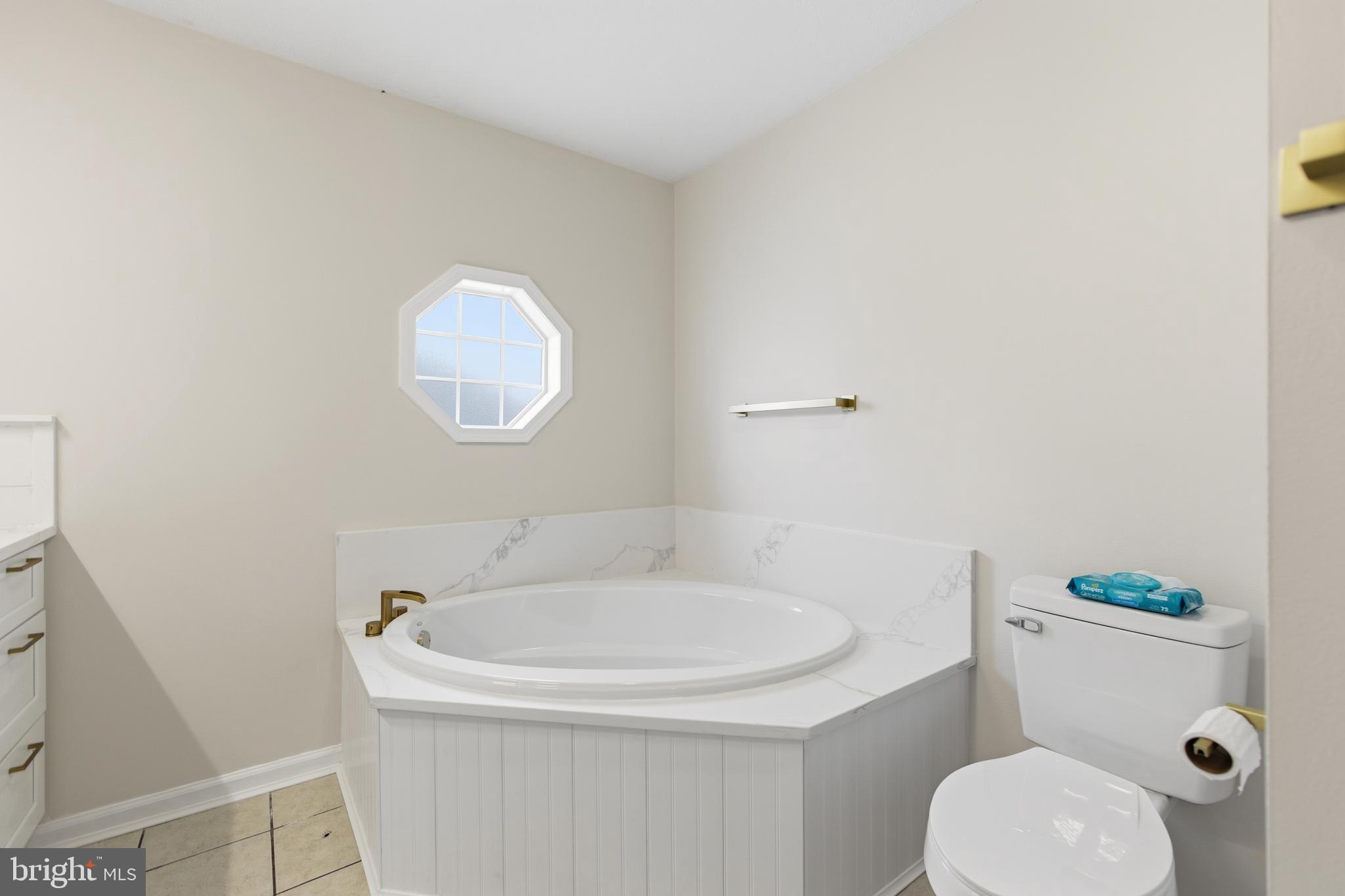 115 Gambrills Road Severn, MD 21144 - Photo 27 of 41 a bathroom with a sink and a toilet