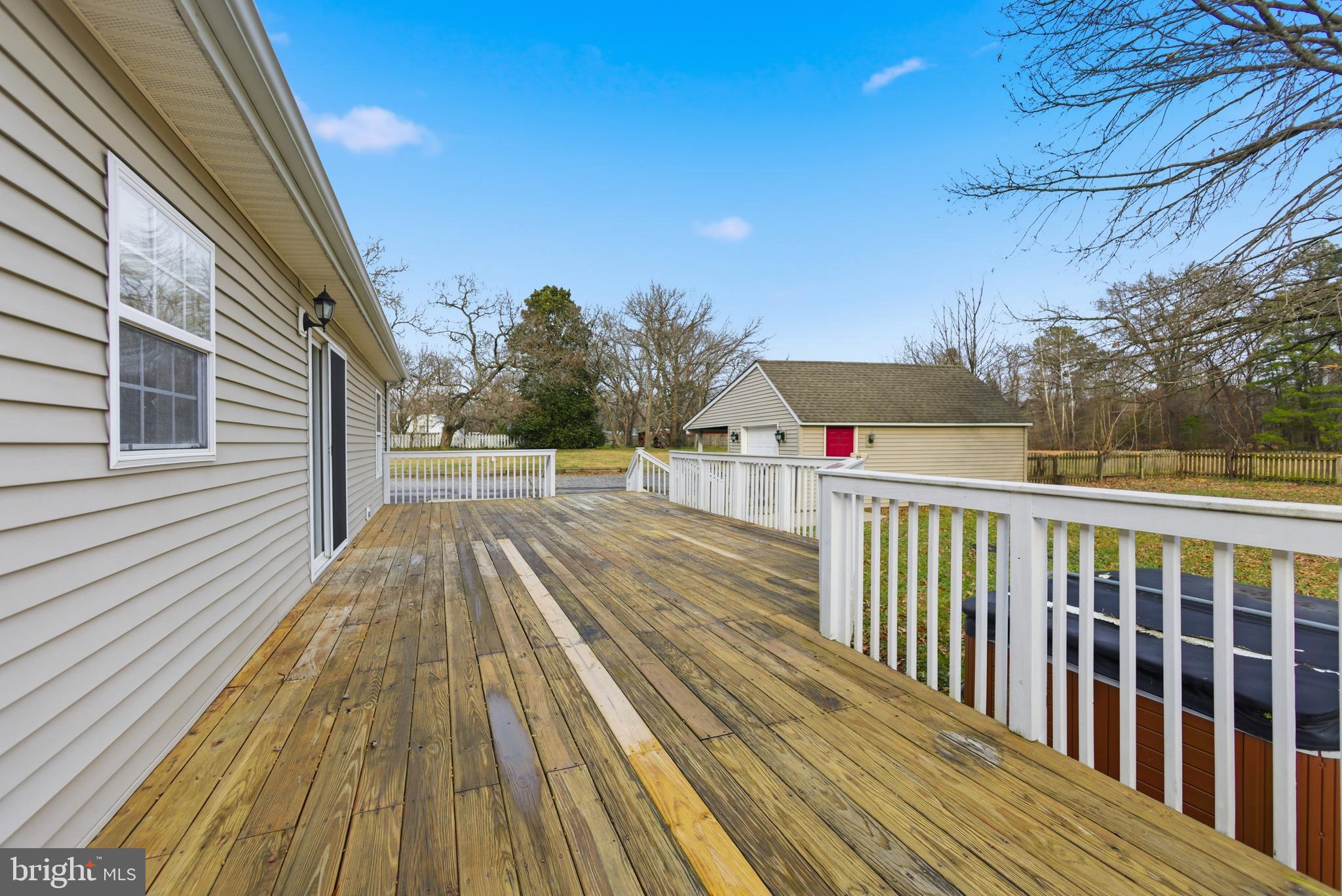 115 Gambrills Road Severn, MD 21144 - Photo 37 of 41 a view of balcony with wooden floor and fence