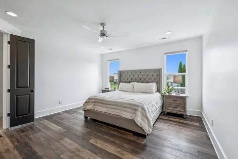 a bathroom with a bathtub and window