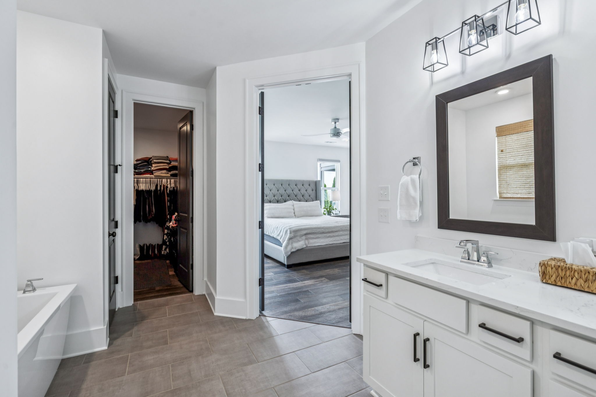 7204 Ludlow Drive College Grove, TN 37046 - Photo 23 of 59 a en suite bathroom with a shower a sink and a mirror