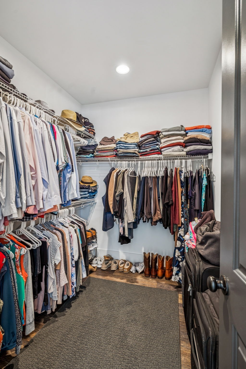 7204 Ludlow Drive College Grove, TN 37046 - Photo 24 of 59 a view of walk in closet with clothes and shoes