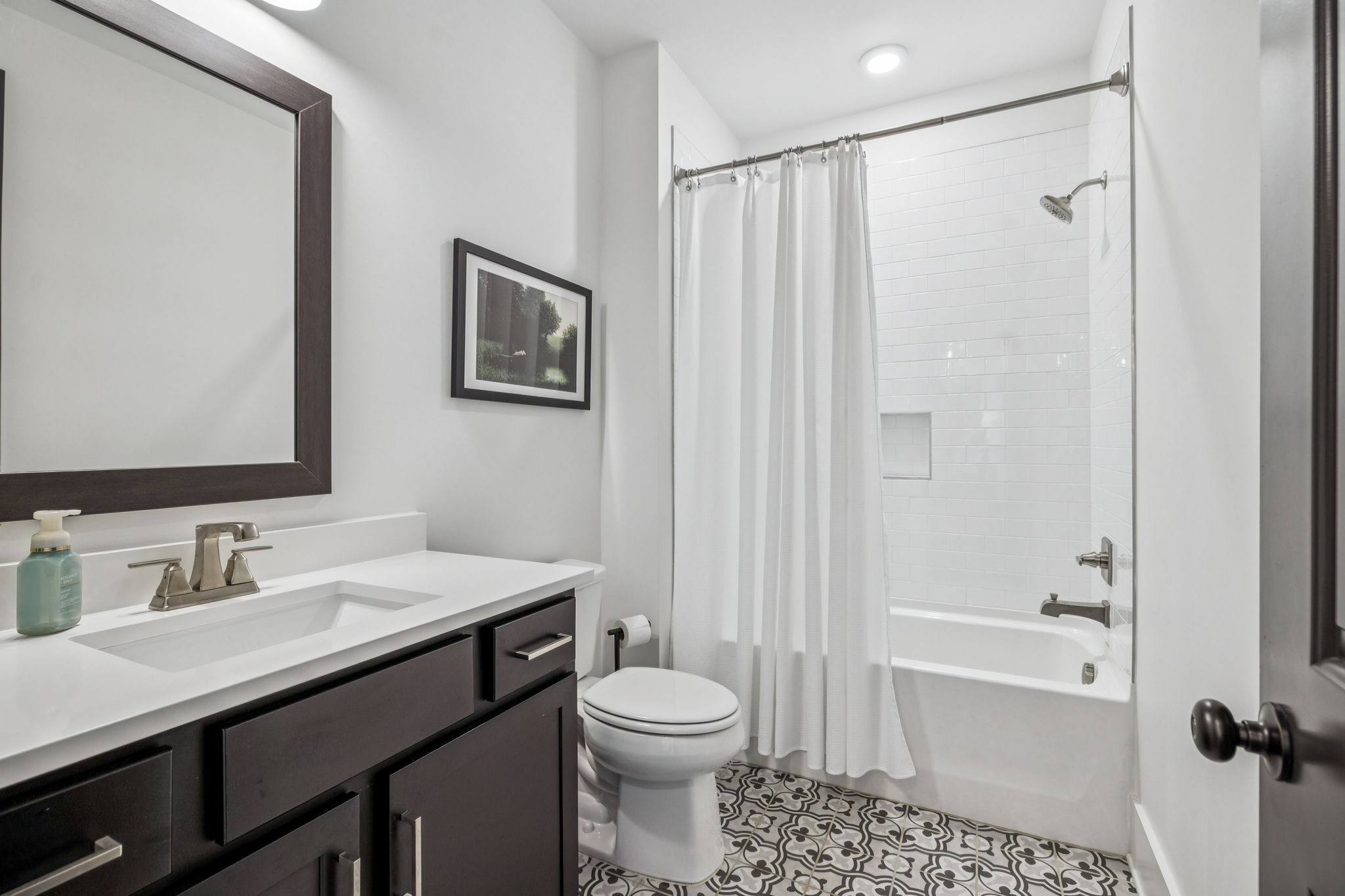 7204 Ludlow Drive College Grove, TN 37046 - Photo 27 of 59 a bathroom with a sink a toilet and shower