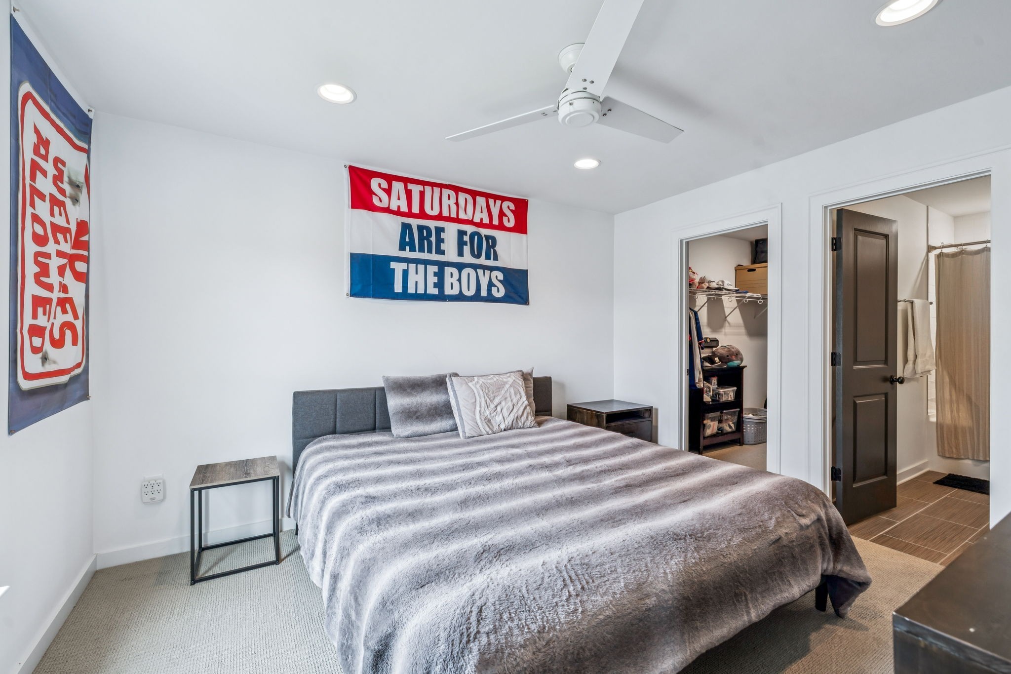 7204 Ludlow Drive College Grove, TN 37046 - Photo 30 of 59 a bedroom with a large bed and a chandelier