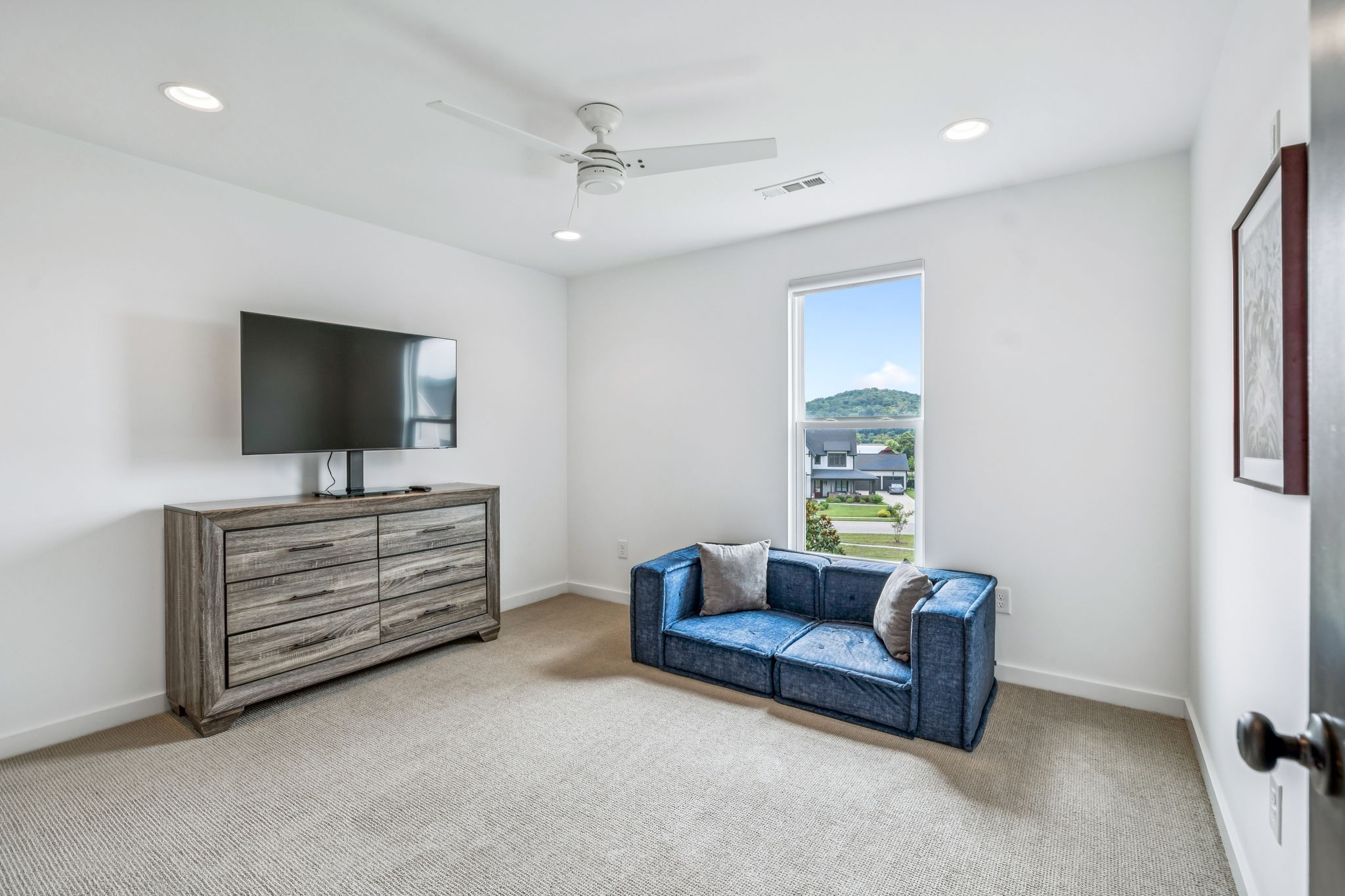 7204 Ludlow Drive College Grove, TN 37046 - Photo 33 of 59 a living room with furniture and a flat screen tv