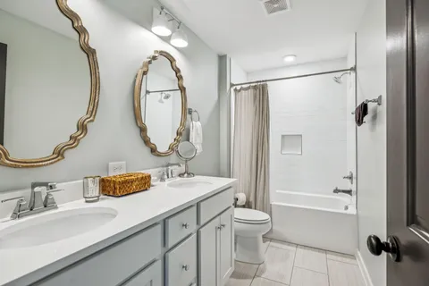 a view of a backyard with sitting area