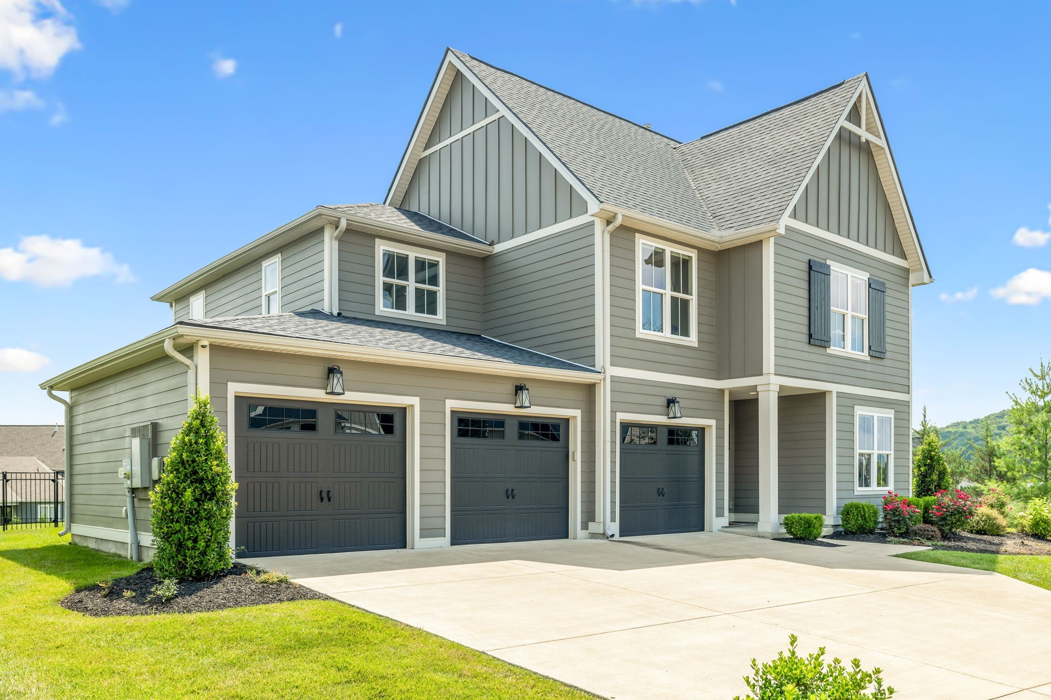 7204 Ludlow Drive College Grove, TN 37046 - Photo 4 of 59 a front view of a house with a garden