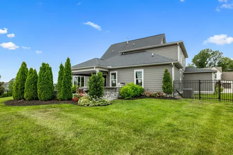 a view of a garden with outdoor seating